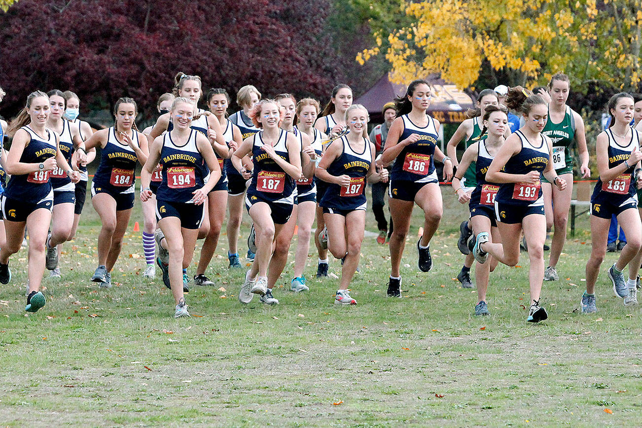 Review file photo 
The Bainbridge HS girls cross country team, shown here taking off during a league meet at Battle Point Park, took home the Olympic League championship last week.