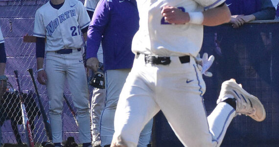 Nicholas Zeller-Singh/Kitsap News Group photos
Spencer Gillespie scores a run for the Vikings.