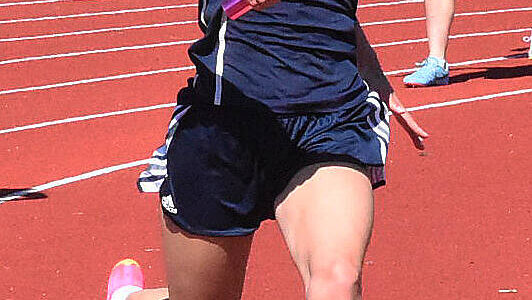 Nicholas Zeller-Singh/Kitsap News Group photos
Bainbridge’s Arden De Lanoy competes in the girls 4x200 relay.